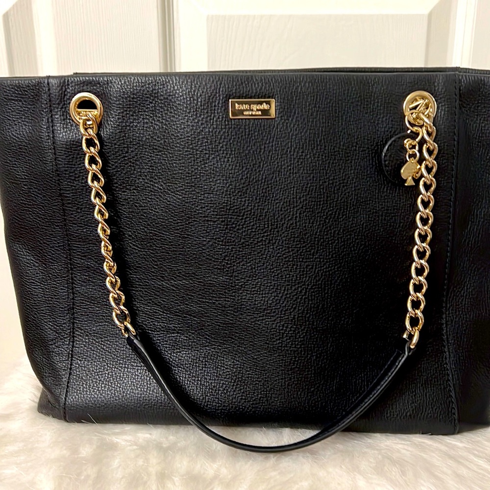 Black Kate Spade purse with gold detailing